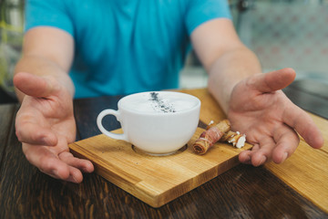 cheese cream soup close up on wooden cafe table