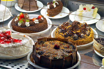 Display of confectionery with cakes and sweet pies