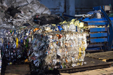 pressed bale with garbage, press, waste sorting and processing, press