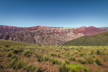 Fototapeta na wymiar Serrania de Hornocal, the fourteen colors hill at Quebrada de Humahuaca - Humahuaca, Jujuy, Argentina