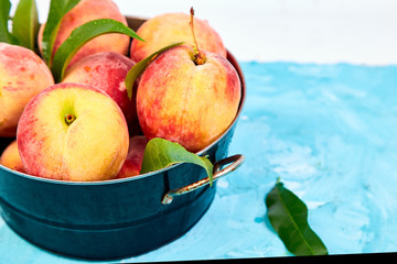 Ripe peaches in a bowl