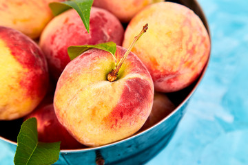 Ripe peaches in a bowl