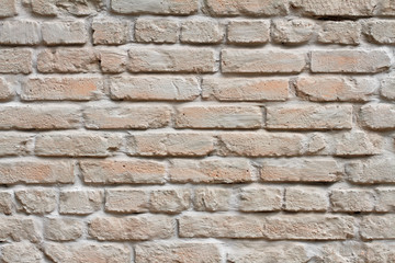 Brick wall painted in pastel color as background, texture