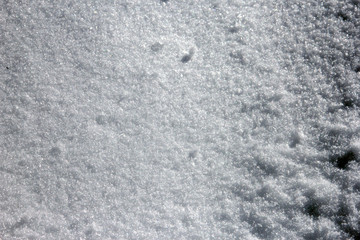 dirty grey white snow surface closeup
