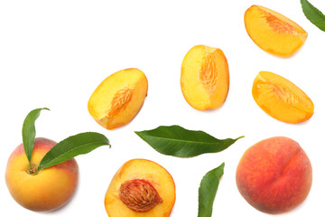 peach fruit with green leaf and slices isolated on white background. top view