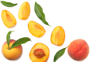 peach fruit with green leaf and slices isolated on white background. top view