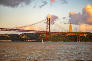 25 de Abril Bridge in Lissabon, Portugal with Cristo-Rei statue