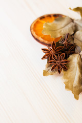 Anise, orange and dry leaves ingredients for preparation wine