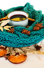 Autumn, fall leaves, hot steaming cup of glint wine