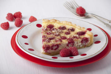 Sand cake with curd filling and raspberries
