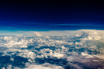 Naklejka na ściany i meble beautiful clouds view from the window of an airplane