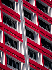 House Wall with Windows and Red Places