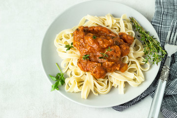 Vegetarian pasta (Tagliatelle) with zucchini, eggplant, bell pepper and tomato sauce.
