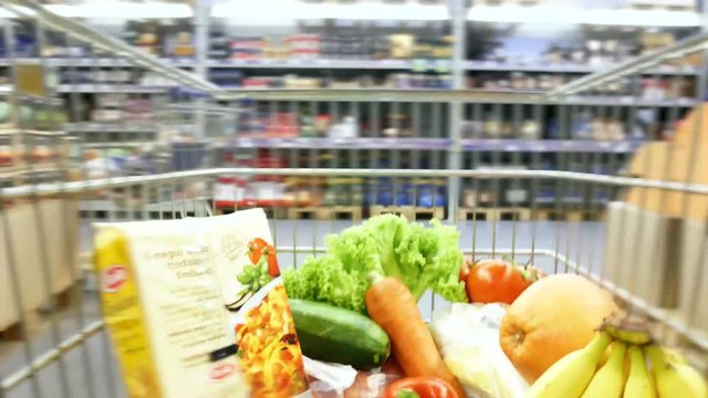Vegetables inside shopping cart. Time lapse. Hyper lapse