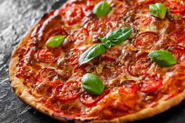  Pizza with Mozzarella cheese, Tomatoes, pepper, Spices and Fresh Basil. Italian pizza. Pizza Margherita or Margarita