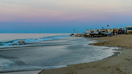 RV and SUV at picnic area on the beach on north side of the Provincelands Cape Cod, Atlantic ocean view MA US