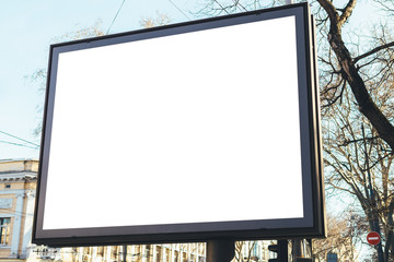 Rectangular empty billboard on street of old city