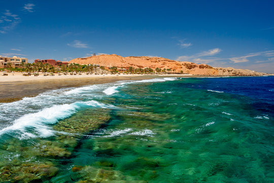 View of Wild Blue Green Waves at the Pier at Calimera Habiba Beach Resort