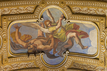 Fototapeta na wymiar REGGIO EMILIA, ITALY - APRIL 13, 2018: The fresco of archangel Michael in church Chiesa di San Pietro by Sebastiano Vercellesi (1603 - 1657).