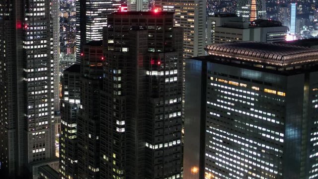 Time Lapse of the Big City Skyscrapers with Lights turning on. Day to Night Transition in the Megapolis.