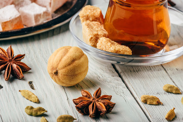 Obraz na płótnie Canvas Tea with turkish delight Rahat Lokum and different spices
