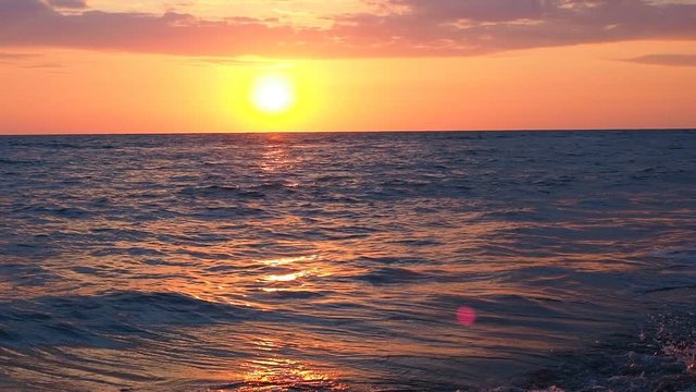 Panorama of Beautiful Red Sunset at the Beach Amazing Colors Light Beam Shining Through the Cloudscape Seascape at Pink Sunset Sea Waves Sliding Camera 25fps