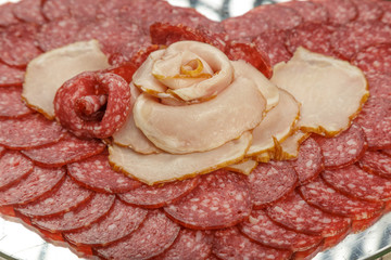 Sausage cuts of different varieties on a plate.