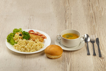 A lunch with a pasta chop with pasta and a roll.