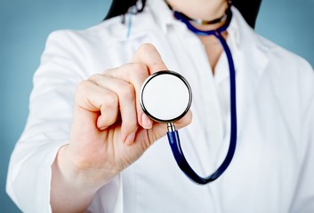 Doctor holding stethoscope