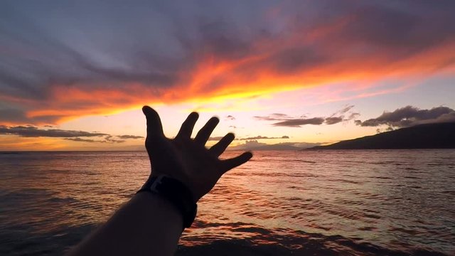 Epic hand reaching into the sunset just to close out the video. Filmed on Maui, Hawaii.