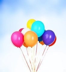 Bunch of colorful balloons on background