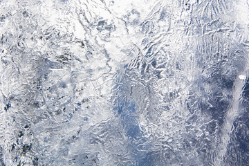 The texture of the ice. The frozen water.Winter background    