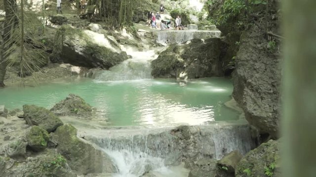 Tumalog falls slider reveal of water running in slow motion.
