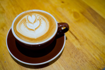 hot coffee cup on table at morning, relax time, latte coffee