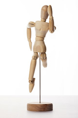 Wooden Dummy human jump isolated white.