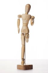 Wooden Dummy human jump isolated white.
