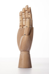 Wooden Dummy hand five isolated white.