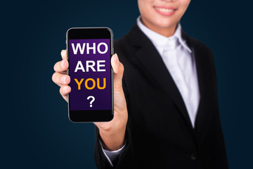 Who Are You?, Happy businesswoman Show text Who Are You? on smart phone