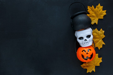 Halloween background with pattern of jack lanterns, cauldrons, skulls on dark blue background. creative decoration, celebration, autumn concept 