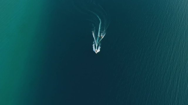 Boat towing water tubes on Torch Lake in northern Michigan