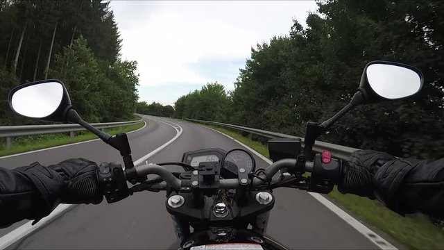 riding a motorcycle with gopro's chesty