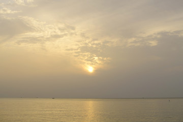 Sunrise in sea the morning  amidst the clouds and the sky is beautiful quiet atmosphere feeling lonely