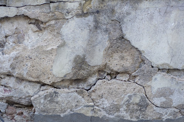 Obraz na płótnie Canvas The old wall of stone blocks