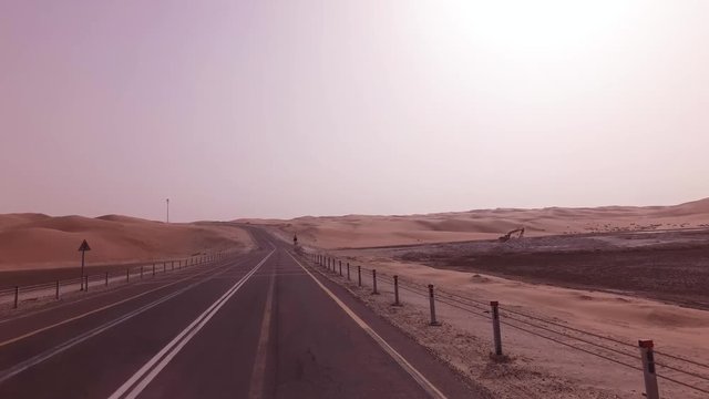 New road from Oasis Liwa to Moreeb Dune in Rub al Khali desert stock footage video