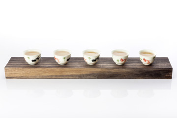 chinese per tea with many cup isolated white.
