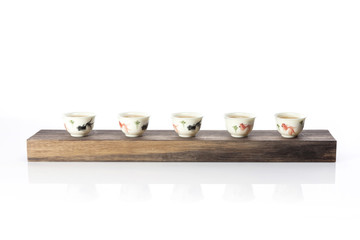 chinese per tea with many cup isolated white.