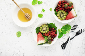 Summer fruit bowl. A useful snack for a healthy vegetarian diet