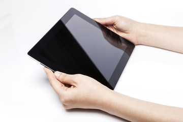 woman hand hold a tablet pc isolated white.