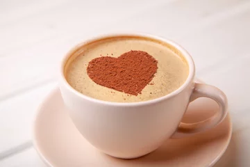 Fotobehang Cup of coffee with heart on foam morning coffee © adragan