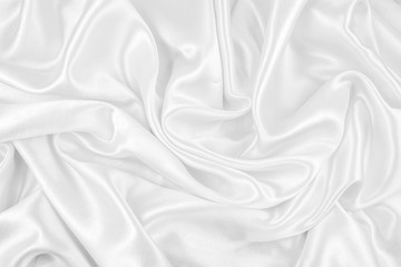 Plakat Luxurious of smooth white silk or satin fabric texture background